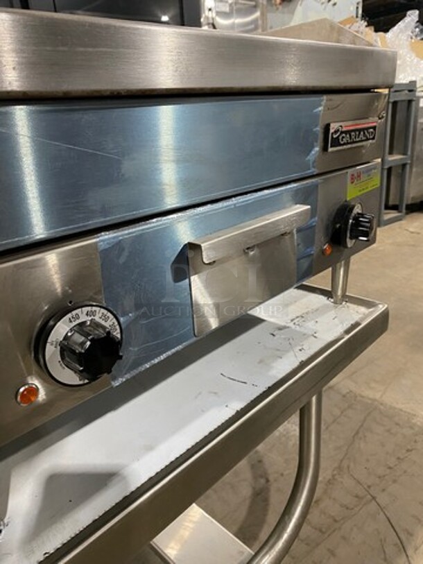 WOW! NEW! NEVER USED! Garland Commercial Countertop Electric Powered Flat Top Griddle! With Back And Side Splashes! On Legs! On Equipment Stand! All Stainless Steel! On Casters! Model: E2448G SN: 0404ME0033 208V 60HZ 3 Phase - Image 7 of 10