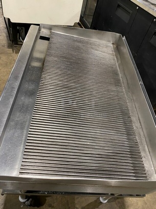 NICE! Imperial Commercial Natural Gas Powered Grooved Grill! With Back And Side Splashes! On Legs! On Equipment Stand! With Storage Space Underneath! All Stainless Steel! On Casters! WORKING WHEN REMOVED! - Image 5 of 10