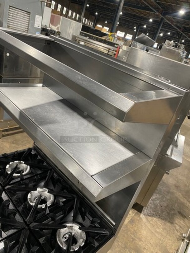 Vulcan Commercial Natural Gas Powered 6 Burner Stove! With Raised Back Splash And Double Overhead Shelves! With Full Size Oven Underneath! Metal Oven Rack! All Stainless Steel! On Casters! - Image 10 of 12