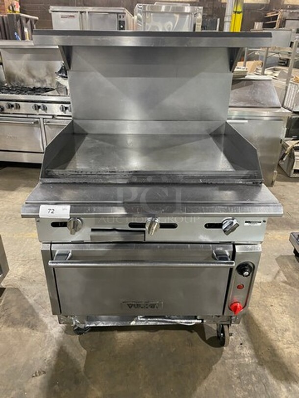 NICE! Vulcan Commercial Natural Gas Powered Flat Top Griddle! With Side Splashes! With Raised Back Splash And Salamander Shelf! All Stainless Steel! On Casters! - Image 1 of 9