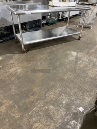 Commercial Worktop/ Prep Top Table! With Storage Area Underneath! Solid Stainless Steel! On Casters!