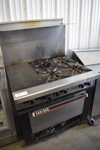 Garland Stainless Steel Commercial Natural Gas Powered 4 Burner Range w/ Left Side Flat Top Griddle, Oven, Over Shelf and Back Splash. 36x30x60