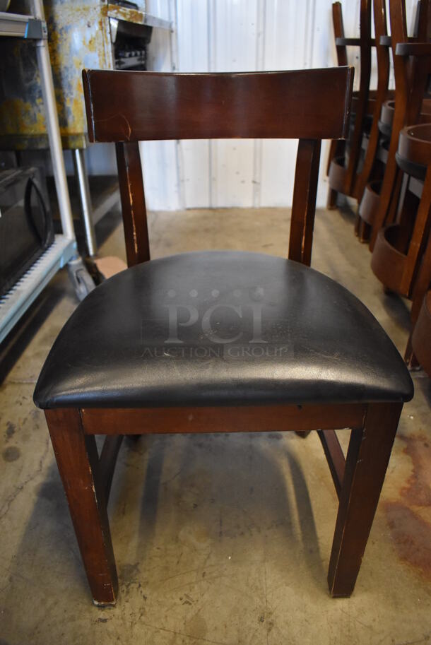 6 Wooden Dining Chairs w/ Black Seat Cushion. Stock Picture - Cosmetic Condition May Vary. 18x18x31. 6 Times Your Bid! 