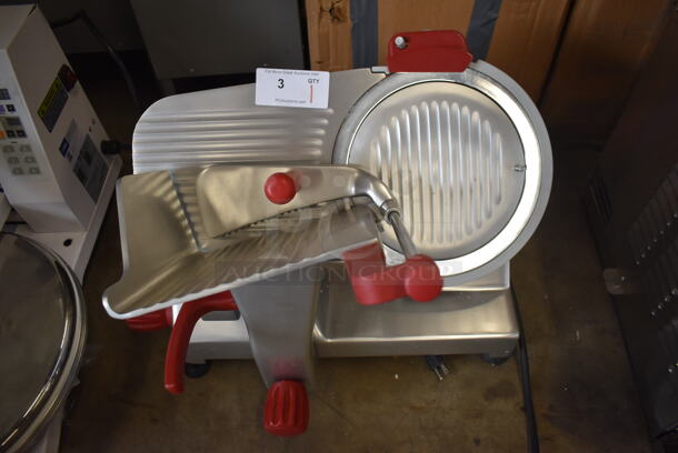 BRAND NEW SCRATCH AND DENT! 2022 Berkel B12-SLC Stainless Steel Commercial Countertop Medium-Duty Gravity Feed Manual Meat Slicer w/ Blade Sharpener. Back Knob Is Broken. 115 Volts, 1 Phase. 23x24x21. Tested and Working!