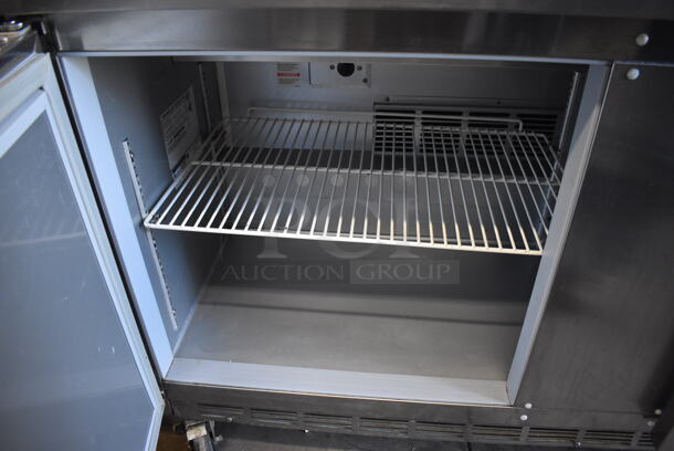 Beverage Air SPE60-16 Stainless Steel Commercial Sandwich Salad Prep Table Bain Marie Mega Top on Commercial Casters. 115 Volts, 1 Phase. 60x29x44. Tested and Powers On But Does Not Get Cold - Image 9 of 9