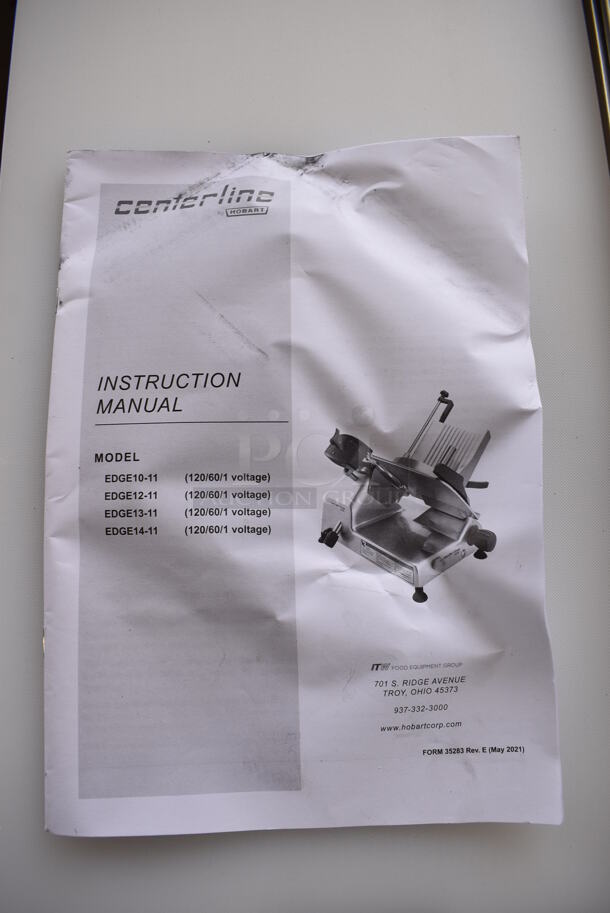 BRAND NEW SCRATCH AND DENT! Hobart Centerline EDGE12-11 Stainless Steel Commercial Countertop 12" Manual Meat Slicer w/ Blade Sharpener. 115 Volts, 1 Phase. 26x22x22. Tested and Working! - Image 5 of 10