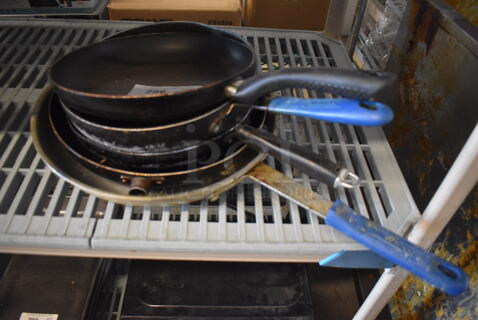 5 Various Metal Skillets. Includes 19x11x2. 5 Times Your Bid!