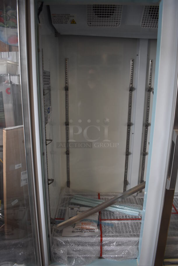 BRAND NEW SCRATCH AND DENT! Avantco 178GCD40HCW Metal Commercial 2 Door Reach In Cooler Merchandiser w/ Poly Coated Racks and LED Lighting on Commercial Casters. Right Door Is Missing 1 Pane of Glass. 115 Volts, 1 Phase. 48x27x85. Tested and Working! - Image 5 of 9