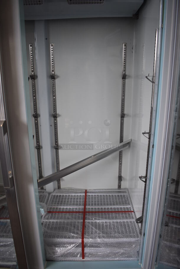 BRAND NEW SCRATCH AND DENT! Avantco 178GCD40HCW Metal Commercial 2 Door Reach In Cooler Merchandiser w/ Poly Coated Racks and LED Lighting on Commercial Casters. Right Door Is Missing 1 Pane of Glass. 115 Volts, 1 Phase. 48x27x85. Tested and Working! - Image 6 of 9