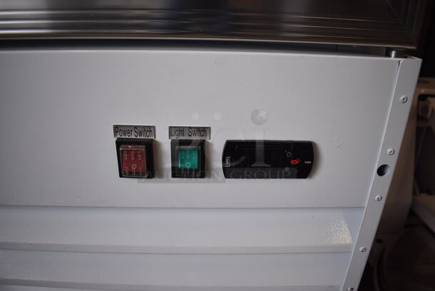 BRAND NEW SCRATCH AND DENT! Avantco 178GCD40HCW Metal Commercial 2 Door Reach In Cooler Merchandiser w/ Poly Coated Racks and LED Lighting on Commercial Casters. Right Door Is Missing 1 Pane of Glass. 115 Volts, 1 Phase. 48x27x85. Tested and Working! - Image 7 of 9