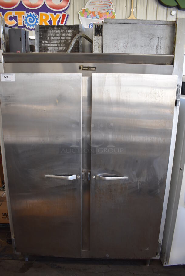 Traulsen Model G22010 ENERGY STAR Stainless Steel Commercial 2 Door Reach In Freezer. 115 Volts, 1 Phase. 52x36x83. Tested and Powers On But Temps at 30 Degrees