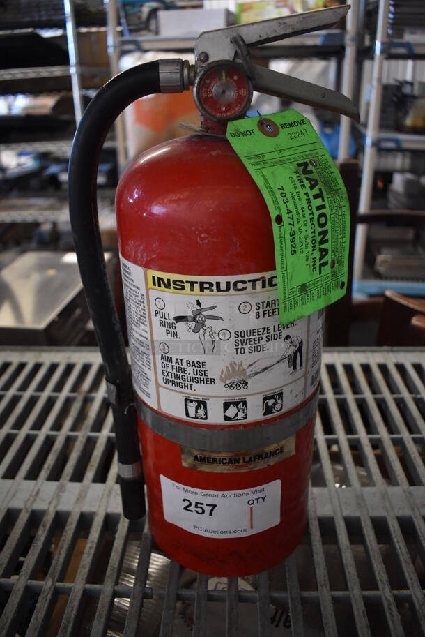 Fire Extinguisher. 7x6x17. Buyer Must Pick Up - We Will Not Ship This Item.  - Image 1 of 5