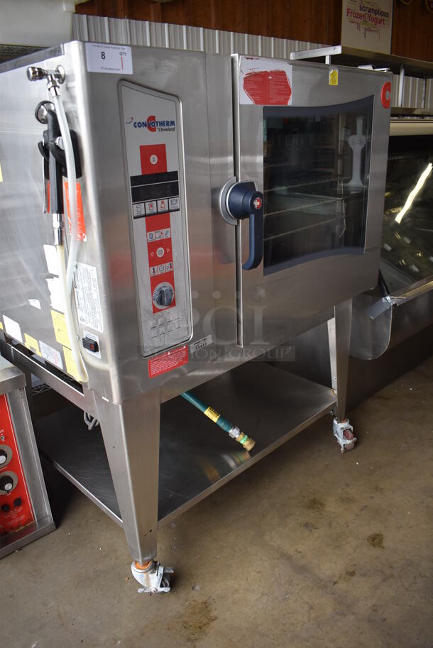 2010 Cleveland OGS-6.20 Stainless Steel Commercial Natural Gas Powered Combi Convection Oven w/ View Through Door, Metal Oven Racks and Under Shelf on Commercial Casters. 75,700 BTU. 51x44x61 - Image 2 of 9