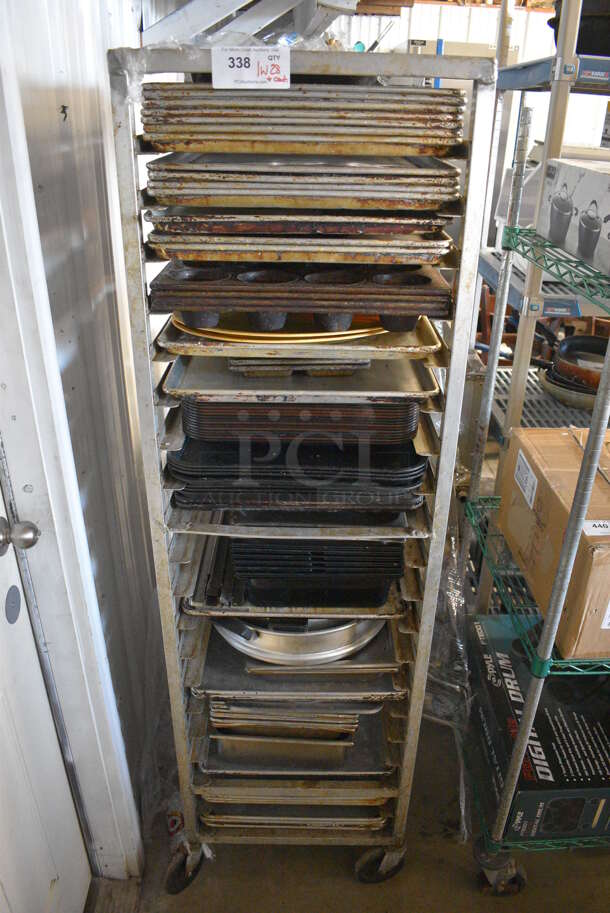 Metal Commercial Pan Transport Rack on Commercial Casters w/ 28 Metal Full Size Baking Pans and Contents. 20.5x26x70