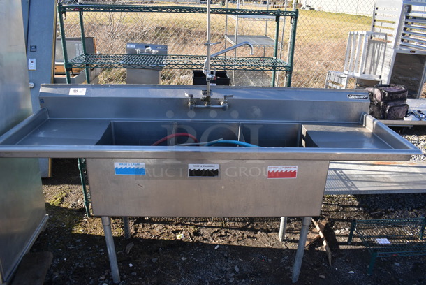 Duke Stainless Steel Commercial 3 Bay Sink w/ Dual Drain Boards, Faucet and Handles. 84x30x43. Bays 16x21x13. Drain Boards 17x23x1 - Image 1 of 10