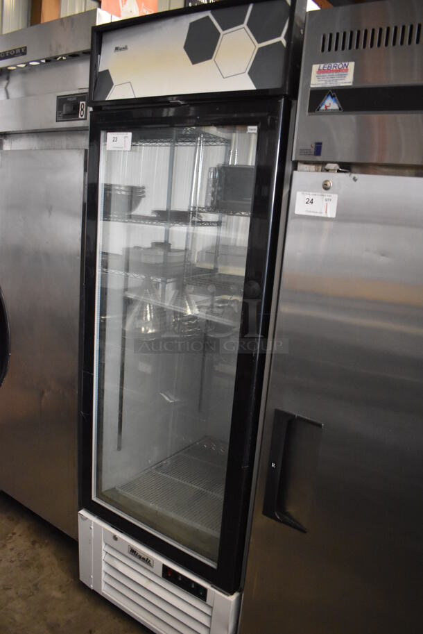 2018 Migali C-23FM-HC Metal Commercial Single Door Reach In Cooler Merchandiser w/ Poly Coated Racks on Commercial Casters. 115 Volts, 1 Phase. 27x32x81. Tested and Powers On But Does Not Get Cold