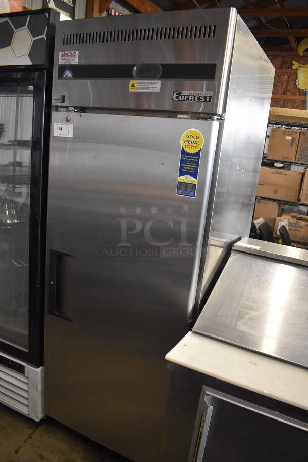 Everest ESR1 Stainless Steel Commercial Single Door Reach In Cooler w/ Poly Coated Racks on Commercial Casters. 115 Volts, 1 Phase. 29x32x79. Tested and Powers On But Does Not Get Cold