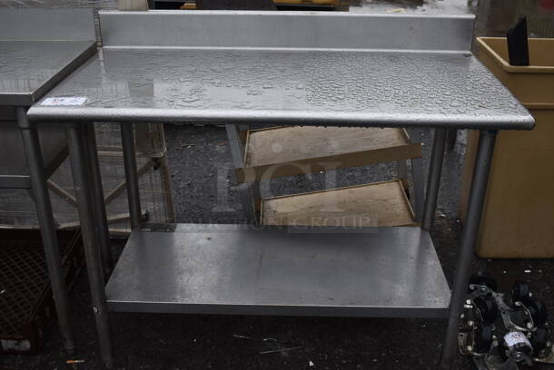 Stainless Steel Table w/ Under Shelf and Back Splash. 48x24x40