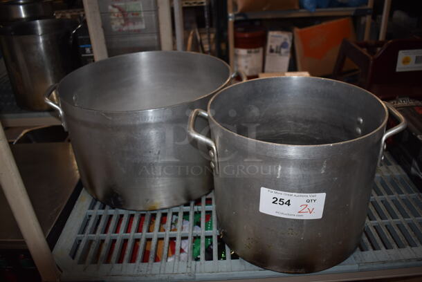 2 Various Metal Stock Pots. 19x16.5x10, 15.5x12x10.5. 2 Times Your Bid!