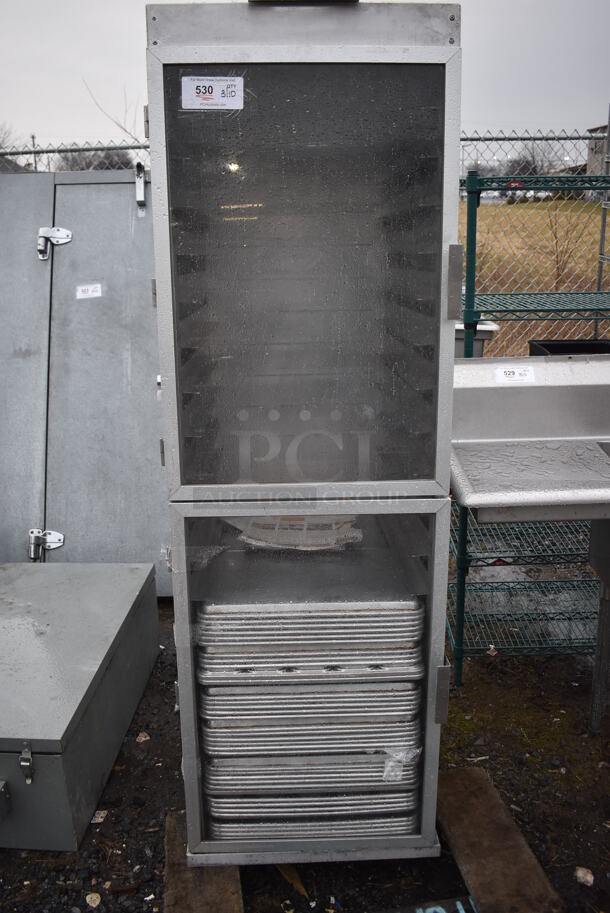 Metal Commercial Enclosed Pan Transport Rack on Commercial Casters w/ 40 Metal Pans. Missing Caster. 21x30x66