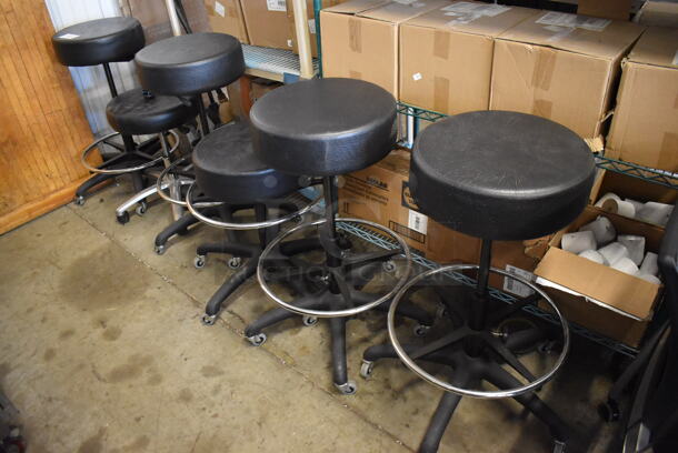 6 Stools on Casters. 5 Have Foot Rest Bar. Includes 25x25x33, 24x24x23. 6 Times Your Bid!