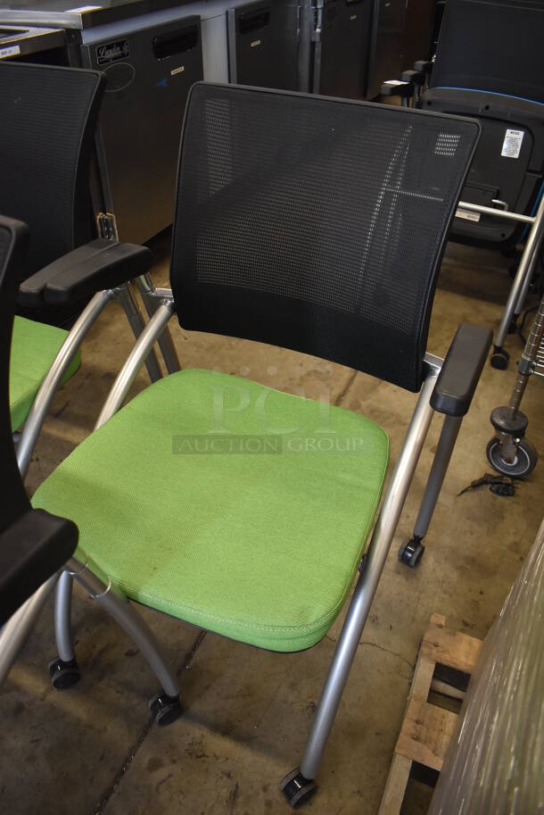 3 Foldable Chairs w/ Arm Rests on Casters. 2 Green and 1 Blue. Stock Picture - Cosmetic Condition May Vary. 24x23x36. 3 Times Your Bid! - Image 4 of 6