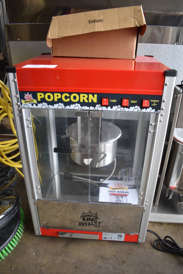 LIKE NEW! Carnival King 382PM50R Royalty Series Metal Commercial Countertop 12 oz. Red Popcorn Machine. Unit Has Only Been Used a Few Times! 120 Volts, 1 Phase. 20x17x30. Tested and Working!