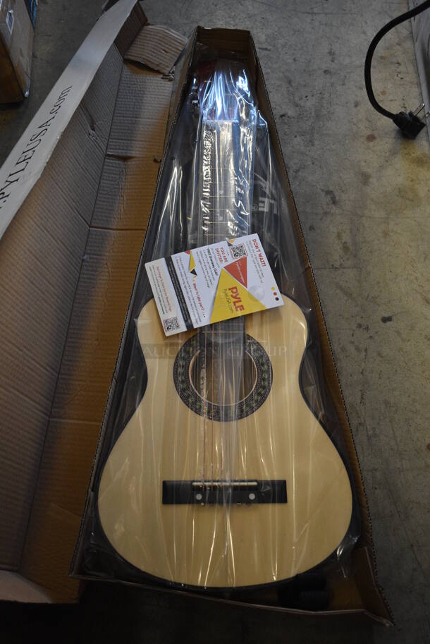 BRAND NEW SCRATCH AND DENT! Pyle PGAKT30 Beginner 30" Acoustic Guitar. 11x2.5x31 - Image 1 of 5
