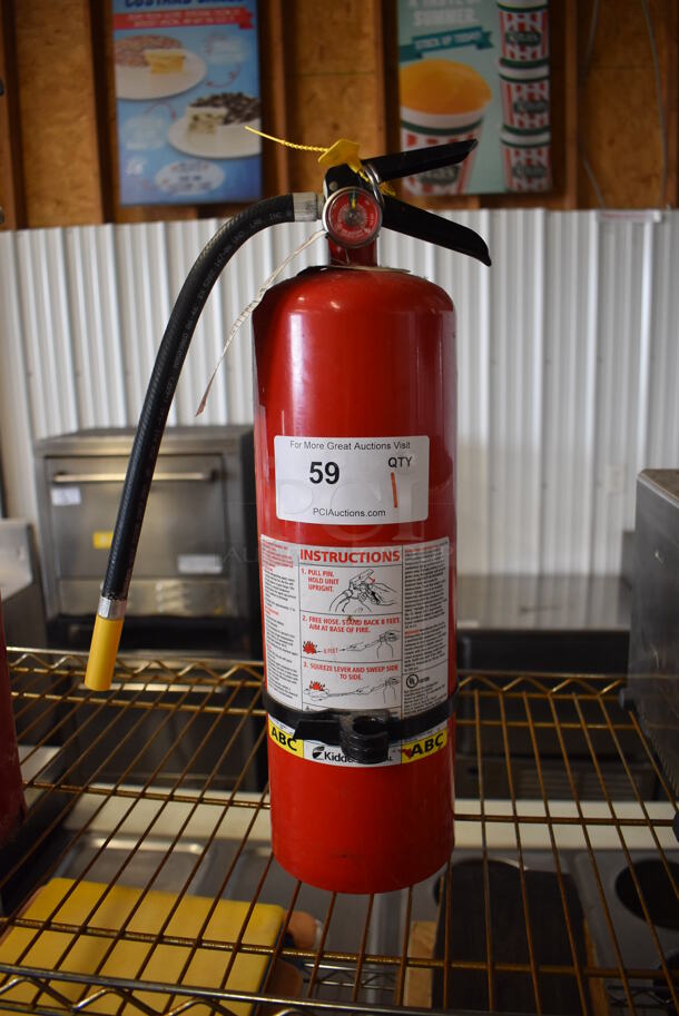 Kidde Fire Extinguisher. 5x7x18.5. Buyer Must Pick Up - We Will Not Ship This Item. 
