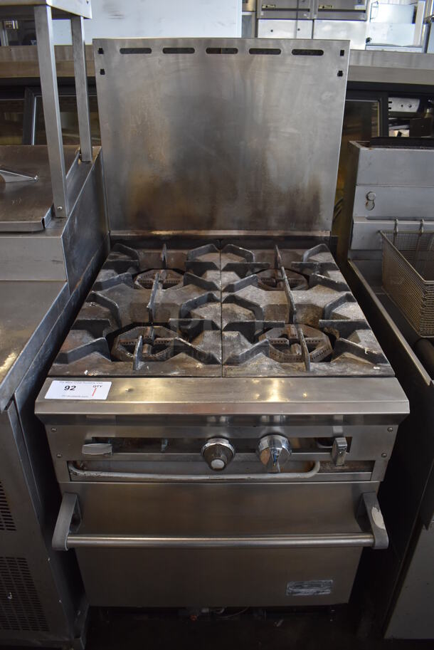 DCS Dynamic Cooking System Stainless Steel Commercial Natural Gas Powered 4 Burner Range w/ Oven and Back Splash on Commercial Casters. 24x32x55