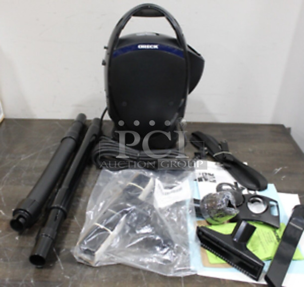 BRAND NEW! Oreck CC1600 Ultimate Handheld Bagged Canister Vacuum. Stock Picture Used For Gallery Picture. 120 Volts, 1 Phase. 14x10x16. Tested and Working! - Image 1 of 8