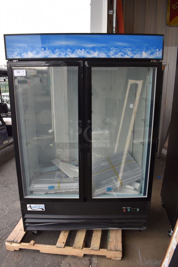 BRAND NEW SCRATCH AND DENT! Avantco 178GDC49FHCB Metal Commercial 2 Door Reach Freezer Merchandiser w/ LED Lighting and Poly Coated Racks on Commercial Casters. 115 Volts, 1 Phase. 53x32x84. Tested and Working!
