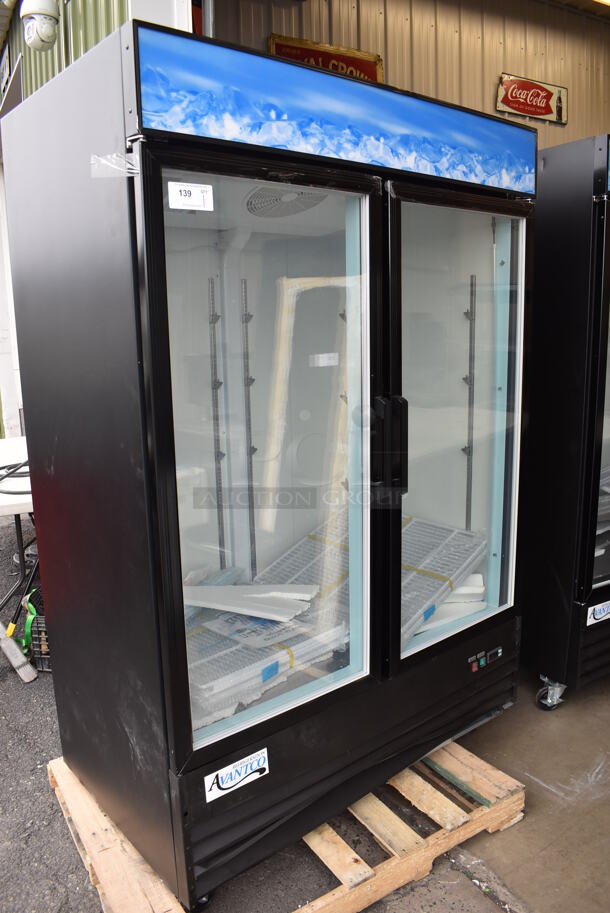 BRAND NEW SCRATCH AND DENT! Avantco 178GDC49FHCB Metal Commercial 2 Door Reach Freezer Merchandiser w/ LED Lighting and Poly Coated Racks on Commercial Casters. 115 Volts, 1 Phase. 53x32x84. Tested and Working! - Image 2 of 8
