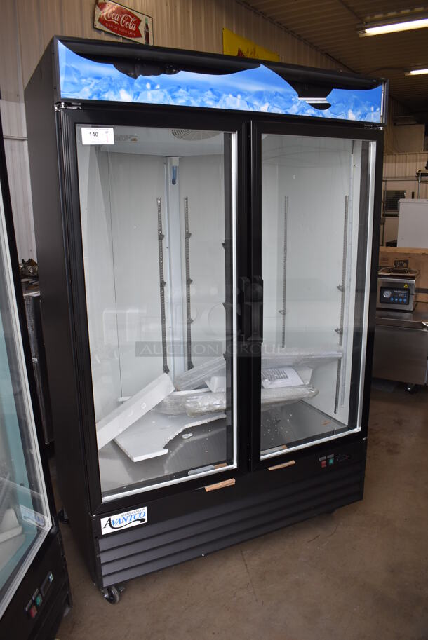 BRAND NEW SCRATCH AND DENT! Avantco 178GDC49HCB Metal Commercial 2 Door Reach Cooler Merchandiser w/ LED Lighting and Poly Coated Racks on Commercial Casters. 115 Volts, 1 Phase. 53x32x84. Tested and Working!