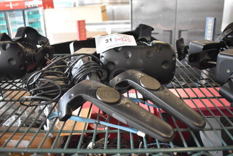 HTC VR Headset w/ 2 HTC Controllers,  2 HTC 2PR8100 Vive Base Stations and 2 Base Station Chargers. 9x12x6, 4.5x5x9, 3.5x2.5x3.5