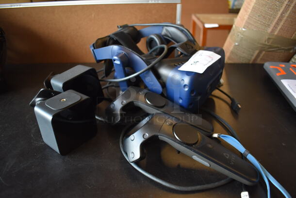 HTC VIVE Pro Virtual Reality Headset w/ 2 Controllers and 2 Base Units. Barely Used. - Image 1 of 9