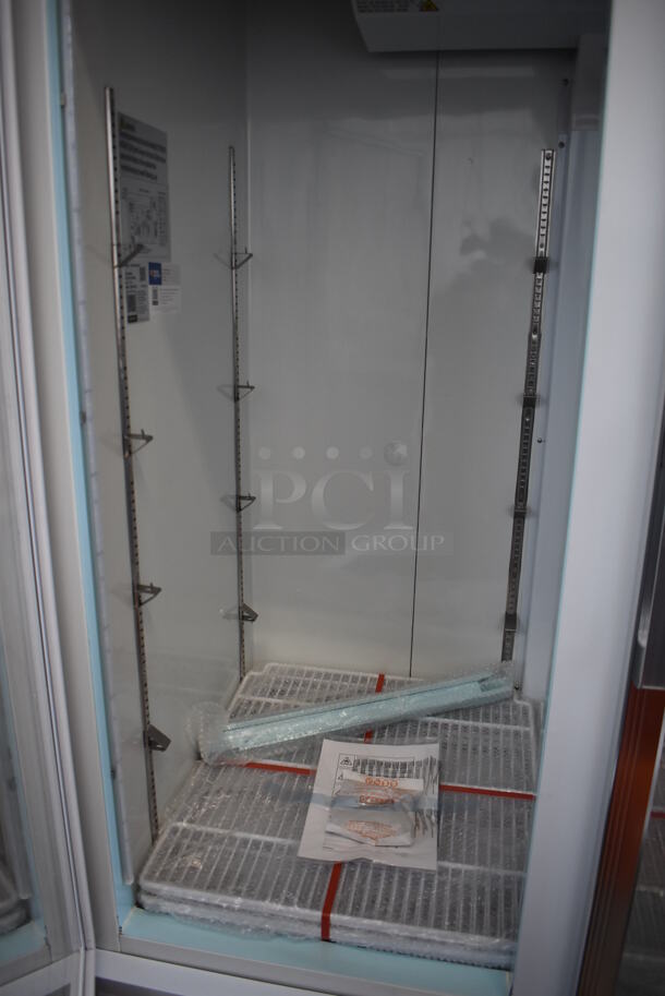 BRAND NEW SCRATCH AND DENT! Avantco 178GDC49FHCW Metal Commercial 2 Door Reach In Freezer Merchandiser w/ LED Lighting and Poly Coated Racks on Commercial Casters. 115 Volts, 1 Phase. 53x32x84. Tested and Working! - Image 4 of 8