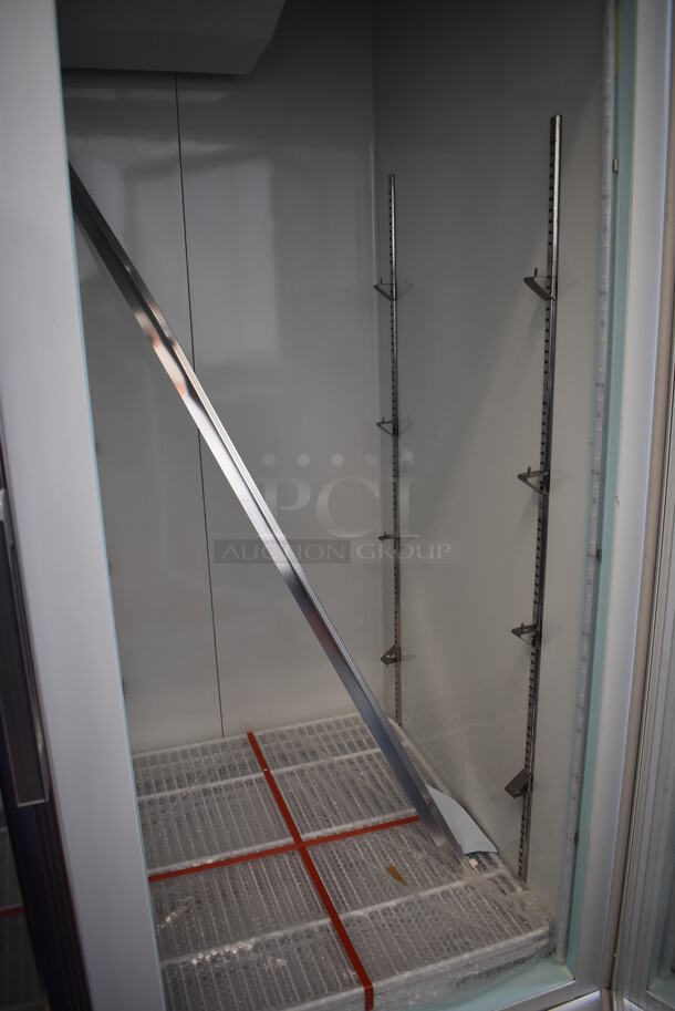 BRAND NEW SCRATCH AND DENT! Avantco 178GDC49FHCW Metal Commercial 2 Door Reach In Freezer Merchandiser w/ LED Lighting and Poly Coated Racks on Commercial Casters. 115 Volts, 1 Phase. 53x32x84. Tested and Working! - Image 6 of 8