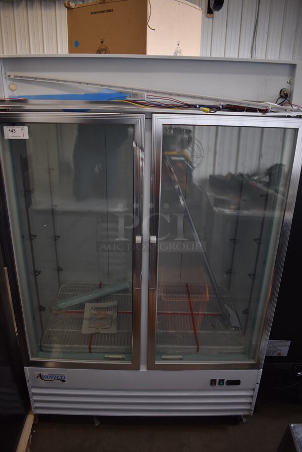 BRAND NEW SCRATCH AND DENT! Avantco 178GDC49FHCW Metal Commercial 2 Door Reach In Freezer Merchandiser w/ LED Lighting and Poly Coated Racks on Commercial Casters. 115 Volts, 1 Phase. 53x32x84. Tested and Working! - Image 7 of 8