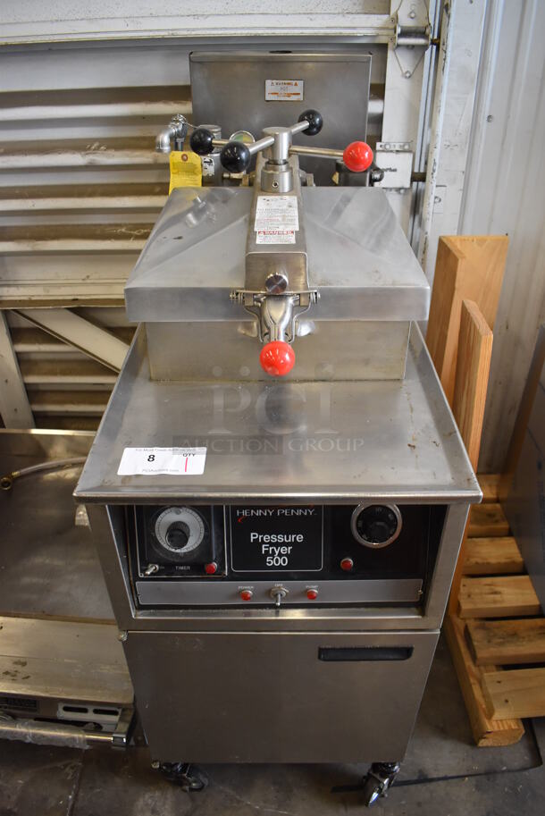 Henny Penny 600 Stainless Steel Commercial Floor Style Electric Powered Pressure Fryer w/ Metal Basket on Commercial Casters. 208 Volts, 1 Phase. 18x39x48