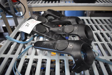 6 HTC Controllers for VR Headset. 4.5x5x9.6 Times Your Bid!