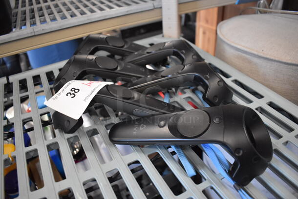 6 HTC Controllers for VR Headset. 4.5x5x9.6 Times Your Bid!