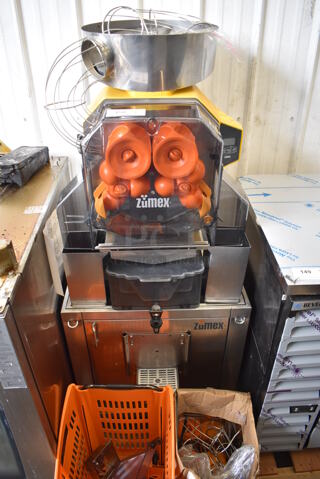 2017 Zumex Speed Pro Tank Podium Stainless Steel Commercial Floor Style Citrus Juicer on Commercial Casters. Comes w/ Extra Pieces: See Pictures For Details! 115 Volts, 1 Phase. 28x30x66. Tested and Does Not Power On