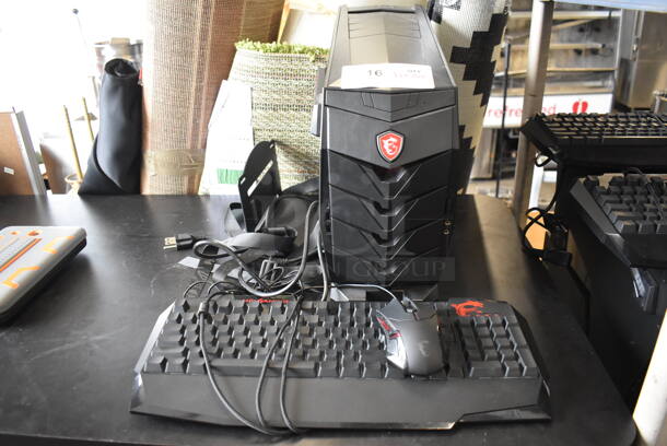 MSI Gaming Desktop Aegis 3 Plus Intel Core i7 8th Gen 8700 (3.20 GHz) 16 GB DDR4 2 TB HDD 256 GB PCIe NVMe SSD NVIDIA GeForce GTX 1070 Ti Windows 10 Home 64-Bit w/ Keyboard, Mouse and Metal Bracket. - Image 1 of 7