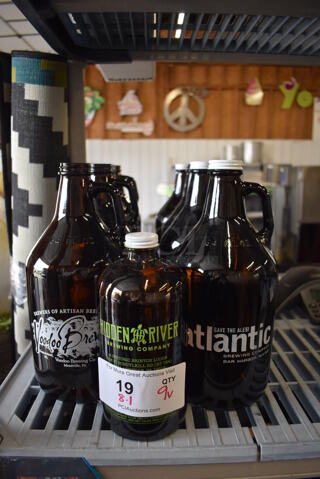 9 Various Brown Glass Bottles; 8 64oz Growlers; 1 32oz Growler. Includes 5x5x11. 9 Times Your Bid!
