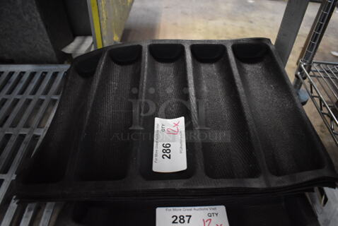 12 Black Silform 5 Loaf Baking Pan Liners. 13x18x1. 12 Times Your Bid!