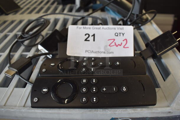 2 Amazon LY73PR Fire TV Sticks w/ 2 Remotes. Includes 5.5