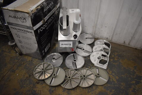 LIKE NEW! AvaMix 177CFP5D Metal Commercial Countertop Dice Continuous Feed Food Processor w/ 6 Slicing Blades, 3 Shredding Blades and 3 Large Blades. Unit Has Only Been Used a Few Times! Goes GREAT w/ Lots 154 and 155! 120 Volts, 1 Phase. 10x22x24. Tested and Working!