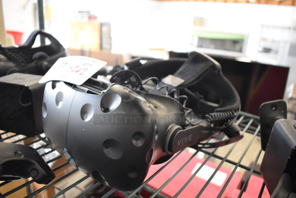 HTC VR Headset w/ 2 HTC Controllers,  2 HTC 2PR8100 Vive Base Stations and 2 Base Station Chargers. 9x12x6, 4.5x5x9, 3.5x2.5x3.5 - Image 3 of 7