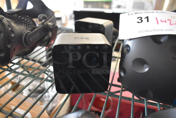 HTC VR Headset w/ 2 HTC Controllers,  2 HTC 2PR8100 Vive Base Stations and 2 Base Station Chargers. 9x12x6, 4.5x5x9, 3.5x2.5x3.5 - Image 4 of 7